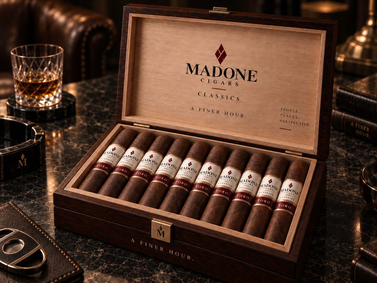 An open Madone Classics Toro box showing a row of Toro cigars and the branded cedar lid.